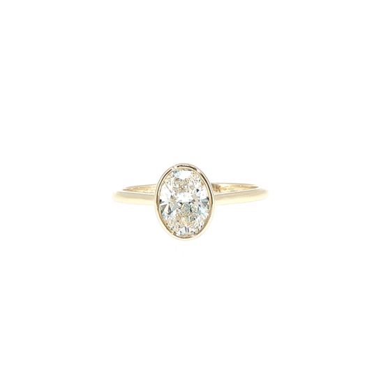 1.05ctw F/VS1 Oval Cut(certified) Lab-Grown Diamond Bezel set Solitaire Ring in 14kt Yellow Gold