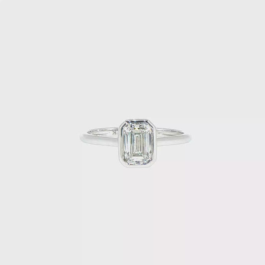 1.00ctw E/VS1 IGI Certified Emerald Cut Lab-Grown Diamond Bezel Solitaire Ring in 14kt White Gold